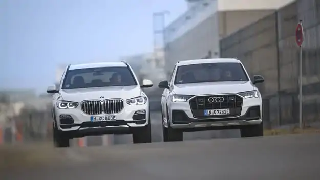 Тест драйв Audi Q7 60 TFSI, BMW X5 45e: модели внедорожников с подключаемым гибридом