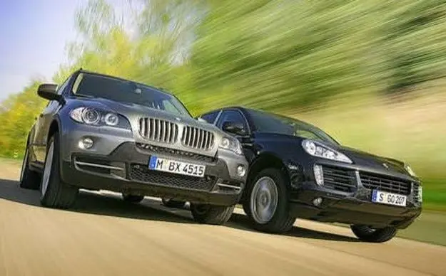 Тест драйв BMW X5 4.8i против Porsche Cayenne S: большая игра